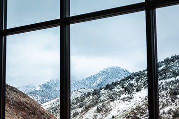 view of mountains through a window