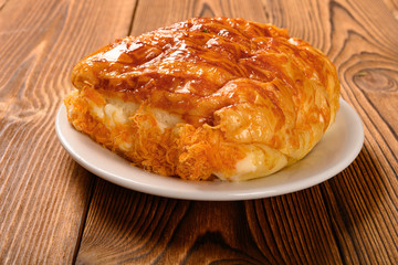 side view shredded pork bread on a dish