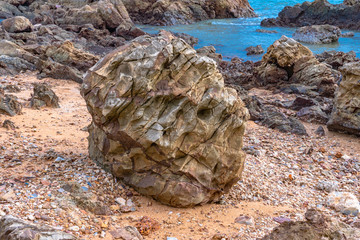 Fresh air at the sea Beautiful stones being beaten by waves.