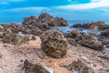 Fresh air at the sea Beautiful stones being beaten by waves.