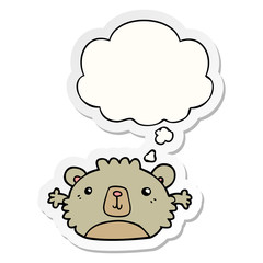 funny cartoon bear and thought bubble as a printed sticker