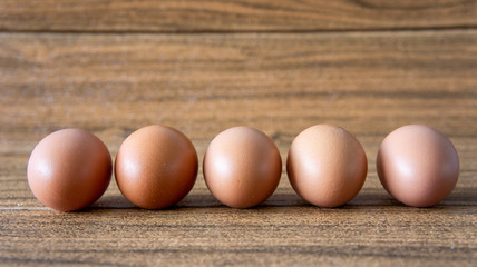 Egg on wooden background