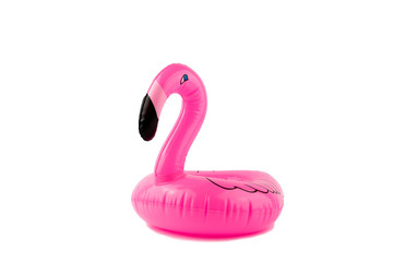 Giant inflatable pink flamingo on a white background. Pool float party. Summer concept.