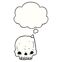 cartoon spooky skull and thought bubble