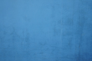 Blue Dirty cement wall background.