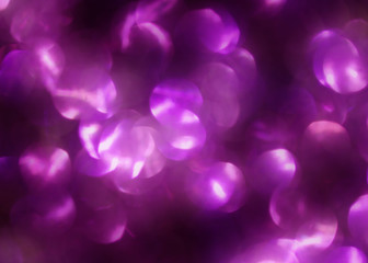 Purple bokeh proton background.