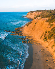 Aerial view of rugged coastline and beaches of the Great Ocean Road, Australia