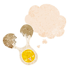 cartoon cracked egg and thought bubble in retro textured style