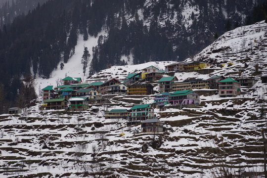 colourful house in a valley during winter