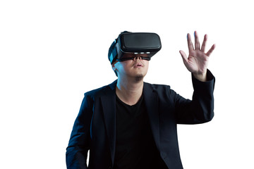 Asian young amazed businessman wearing virtual reality headset isolated on white background .Future multimedia visual effects technology concept .