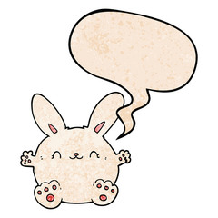 cute cartoon rabbit and speech bubble in retro texture style