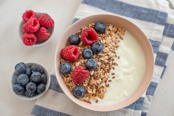 Granola with yogurt and berries for healthy breakfast