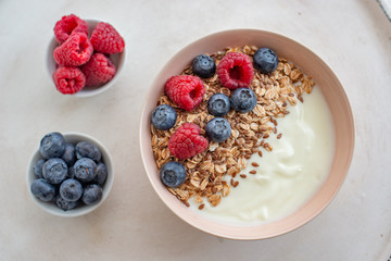 Granola with yogurt and berries for healthy breakfast