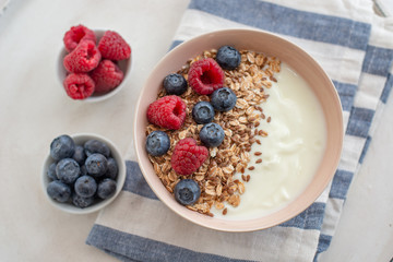 Granola with yogurt and berries for healthy breakfast