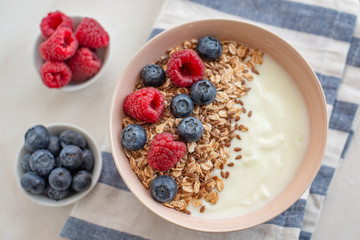 Granola with yogurt and berries for healthy breakfast