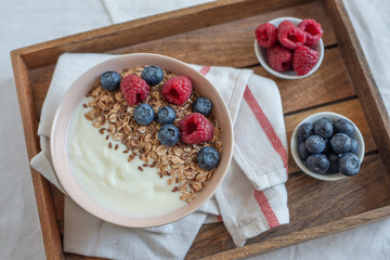 Granola with yogurt and berries for healthy breakfast