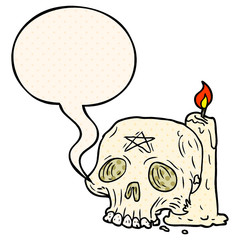 cartoon spooky skull and candle and speech bubble in comic book style