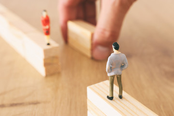 concept image of gender gap, A man and a woman look at each other from a distance