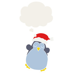 cute christmas penguin and thought bubble in retro style