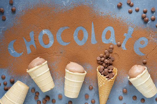 chocolate ice cream in a waffle Cups Chocolate drops in a waffle cone and word Chocolate made by cocoa pouder