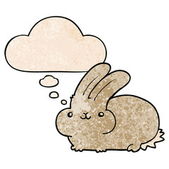 cartoon rabbit and thought bubble in grunge texture pattern style