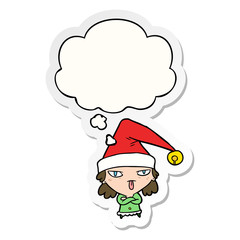 cartoon girl wearing christmas hat and thought bubble as a printed sticker