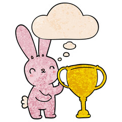cute cartoon rabbit with sports trophy cup and thought bubble in grunge texture pattern style