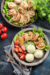 Pork rolls stuffed with mozzarella