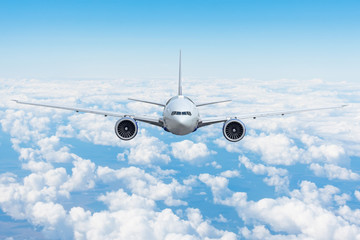Travel trip vacation airplane is flying above the day clouds.