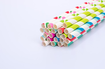 Paper straw in multi-color with stripes and dots pattern