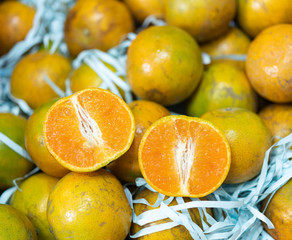 Orange fruits pack in paper box background