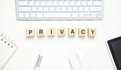 Privacy word on wooden cubes. Business desk