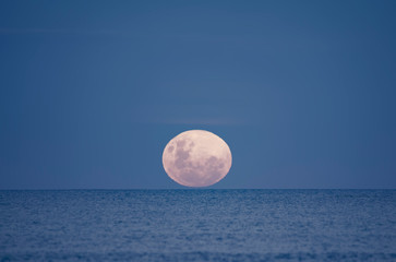 Full moon rising over the ocean, Torquay Surf Beach