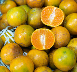Orange fruits pack in paper box background