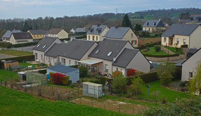 Fototapeta na wymiar SOURDEVAL, FRANCE - April 6th 2019 - Houses in the village