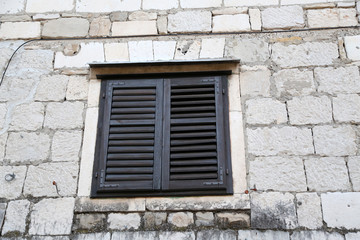 Shuttered windows - Old houses with shuttered windows