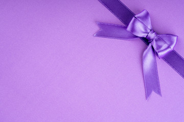 purple ribbon on purple background