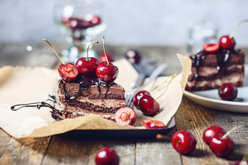 Chocolate cake with fresh cherries.
