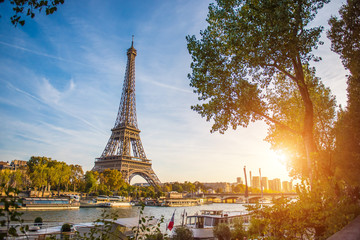 Sunset view of Eiffel tower and Seine river in Paris, France. Architecture and landmarks of Paris....