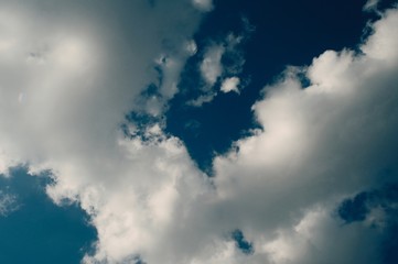 blue sky with clouds and sun