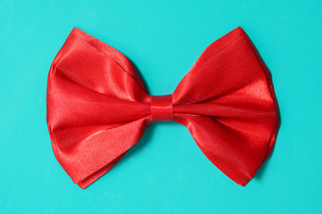 red bow ite on green background