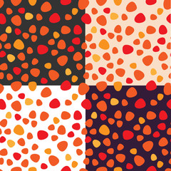 Vector set of seamless patterns of red and orange spots. Black, white, light orange, violet backgrounds