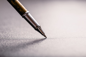 Fototapeta premium automatic plastic ballpoint pen with clipping path on black background. close up.