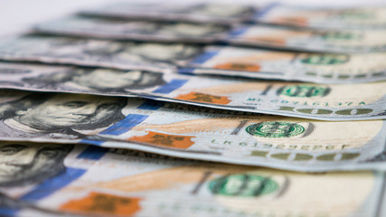 One hundred dollar bills close-up.