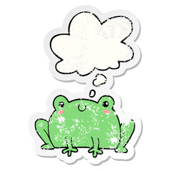 cartoon frog and thought bubble as a distressed worn sticker