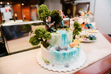 Big wedding cake close-up on the wedding table close up