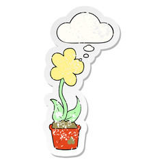 cute cartoon flower and thought bubble as a distressed worn sticker
