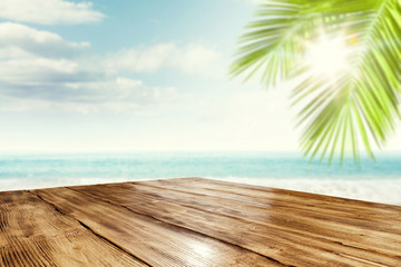 Desk of free space and summer beach landscape with sea 