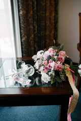Bridal bouquet of flowers of the bride close up