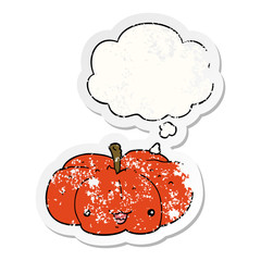 cartoon pumpkin and thought bubble as a distressed worn sticker